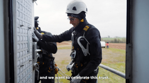 Workers operating inside a wind turbine